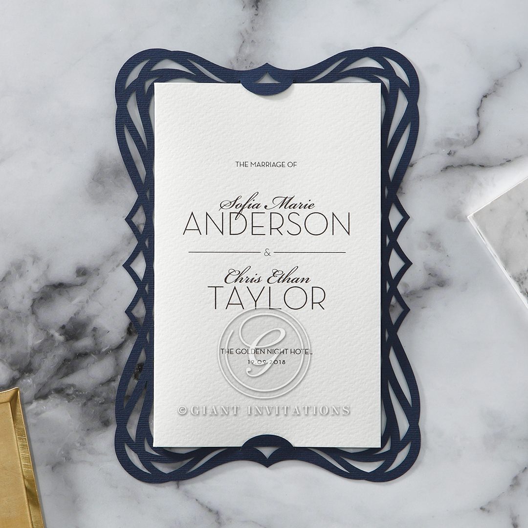 Classic matte white lightly textured insert card, printed in calligraphic writing, inserted in a deep navy blue laser cut bordered backing layer
