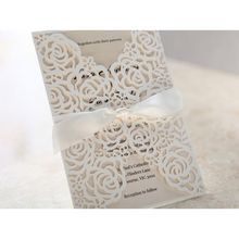 Cropped floral gatefold; white laser cut invitation; beige inner paper