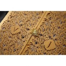 Golden wild lotus flower seal, customisable golden initials on an intricate laser cut sleeve
