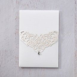 Silk screened light grey inner card printed in high rise fonts, enclosed in an eye-catching pocket with intricate laser cut flap adorned with a jewel stud
