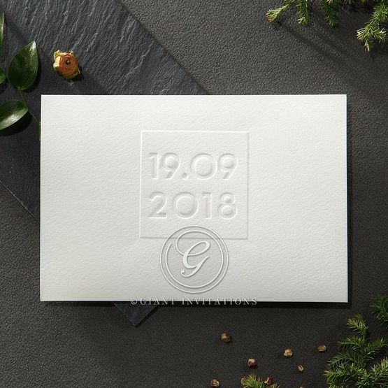 Minimalistic lightly textured card featuring an embossed date on outer cover and calligraphic wording on the main invite
